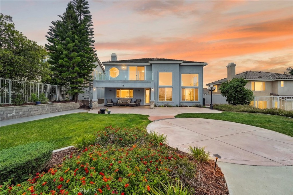 16318 Sun Summit Drive Riverside, CA 92503 - Photo 6 of 47 Back of home with balcony 16318 sun summit drive, riverside, california 92503(AI Twilight Edit)