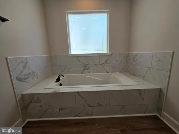 a bathroom with a bathtub