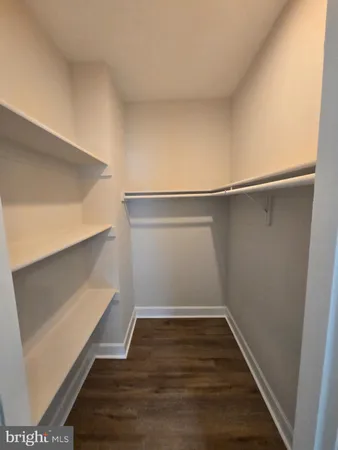 a view of an empty walk in closet