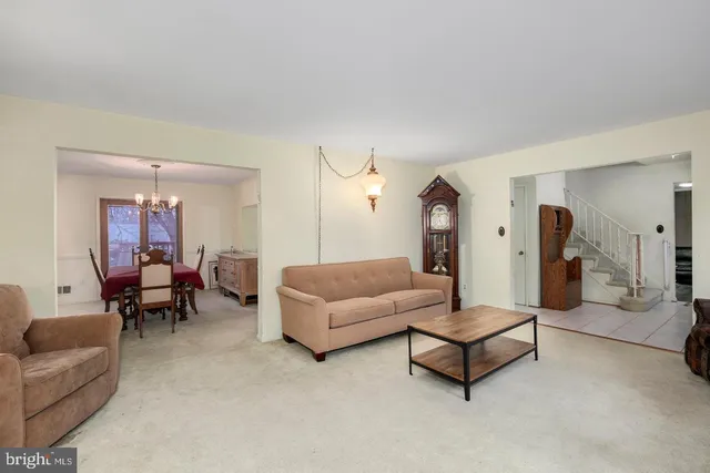 a living room with furniture and a couch