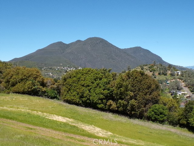 10450 Sunset Ridge Drive Kelseyville, CA 95451 - Photo 3 of 5 a view of a mountain with an outdoor space