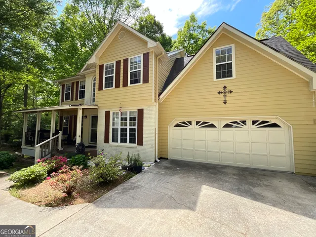 a view of a house with garden