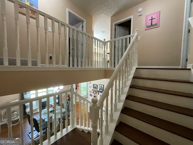 a kitchen with a stove and cabinets