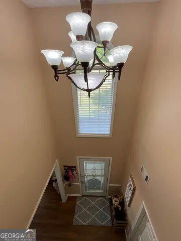 a bedroom with a bed and a walk in closet