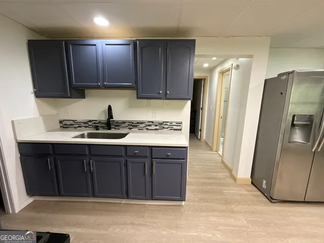 a sign that is on the side of a building