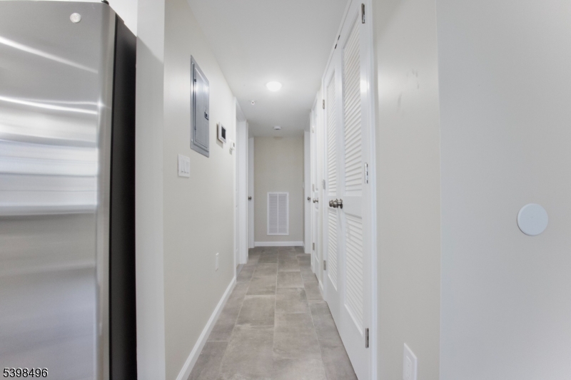 32 Garibaldi Avenue, Unit 1 Newark, NJ 07114 - Photo 5 of 12 a view of a hallway