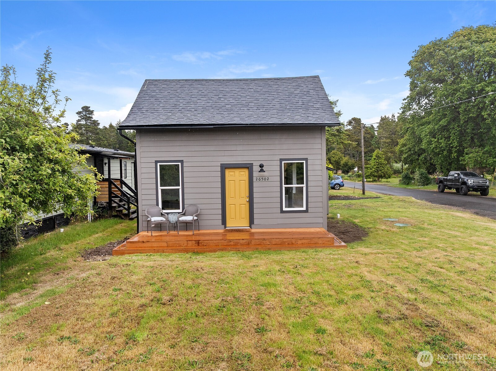 26502 Ridge Avenue Ocean Park, WA 98640 - Photo 25 of 30 a front view of a house with a yard