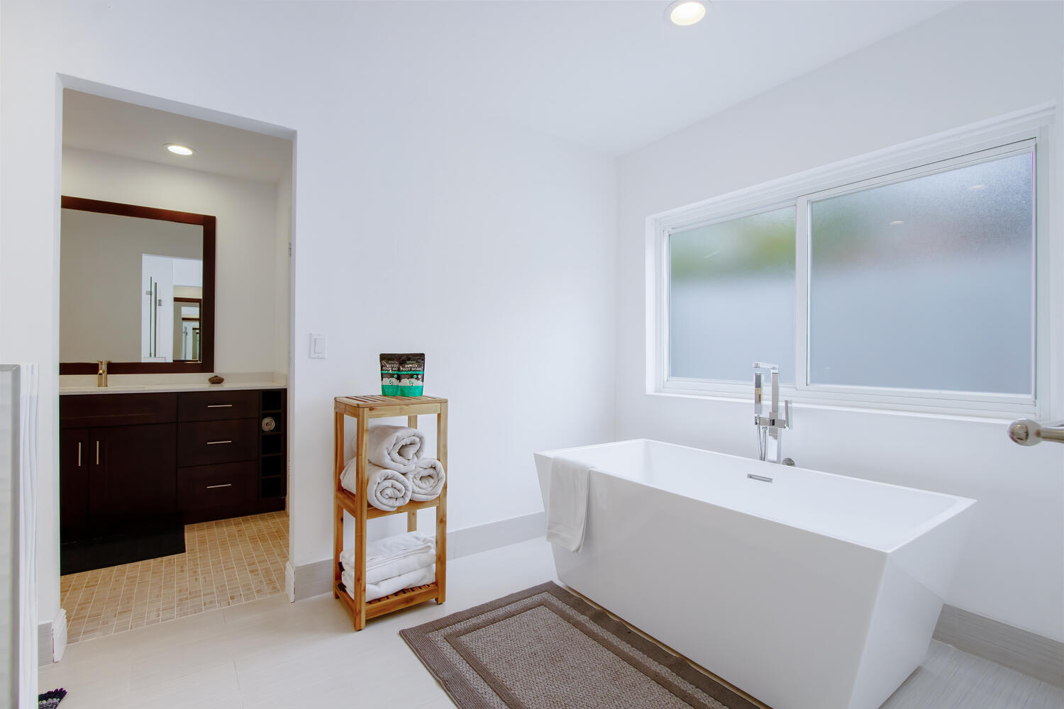 12327 Quercus Lane Wellington, FL 33414 - Photo 14 of 34 a bathroom with a sink and a mirror