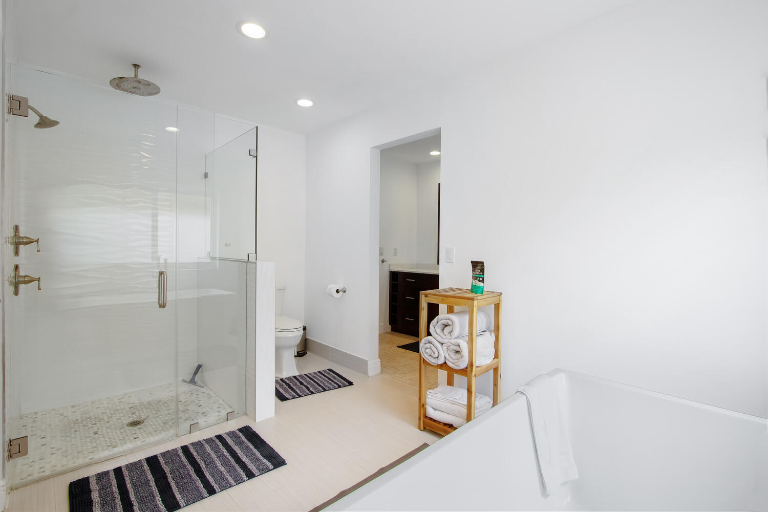 12327 Quercus Lane Wellington, FL 33414 - Photo 15 of 34 a bathroom with a bathtub and a shower