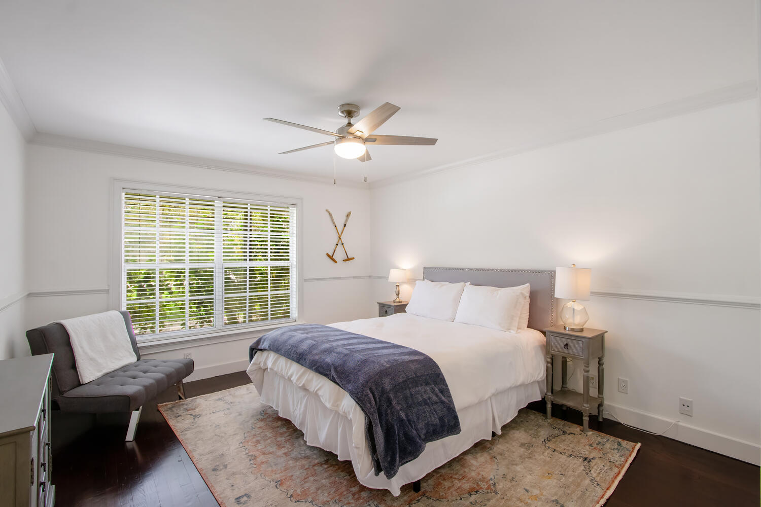 12327 Quercus Lane Wellington, FL 33414 - Photo 16 of 34 a spacious bedroom with a bed and a couch
