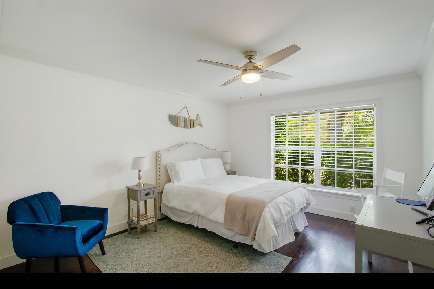 12327 Quercus Lane Wellington, FL 33414 - Photo 17 of 34 a bedroom with a bed and a couch