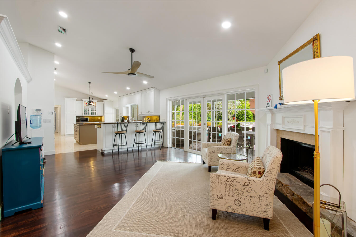 12327 Quercus Lane Wellington, FL 33414 - Photo 7 of 34 a living room with furniture fireplace and flat screen tv