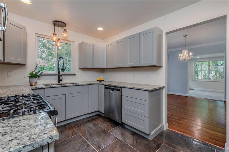 3325 Comanche Road Pittsburgh, PA 15241 - Photo 11 of 25 Don't Miss the All New Granite Counter Tops, Oil Rubbed Bronze Industrial Faucet and Oil Rubbed Bronze Light Fixture Above the Sink