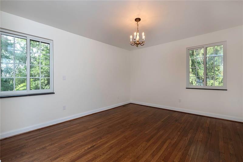 3325 Comanche Road Pittsburgh, PA 15241 - Photo 14 of 25 Master Suite with All New Windows, Refinished Hardwood Flooring, Rebuilt Chandelier and Great Views of the Wooded Rear Lot