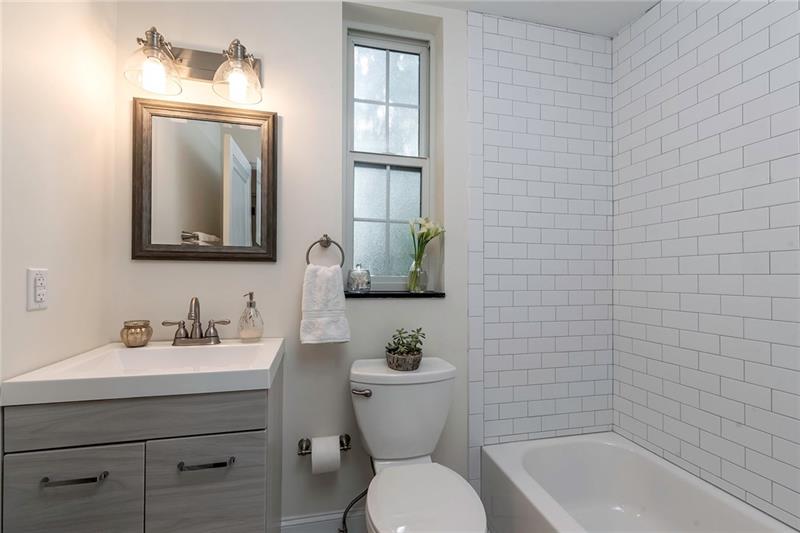 3325 Comanche Road Pittsburgh, PA 15241 - Photo 18 of 25 Hall Bath with All New Vanity, Custom Subway Tile Shower Surround, Carrara Marble Flooring and New Light/Mirror. Lovely!!