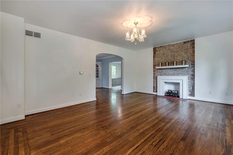 3325 Comanche Road Pittsburgh, PA 15241 - Photo 4 of 25 Spacious Living Room with Charming Decorative Fireplace, Newly Rebuilt Chandelier and Newly Refinished Hardwood Flooring!