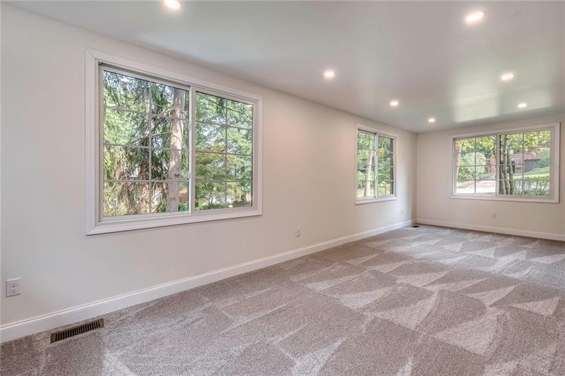 3325 Comanche Road Pittsburgh, PA 15241 - Photo 8 of 25 Family Room with New Grey Carpet, New Recessed Lighting and Amazing Natural Light!