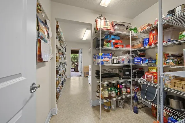 a room with storage and utility room