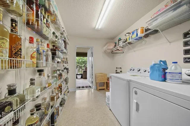 a utility room with cabinets