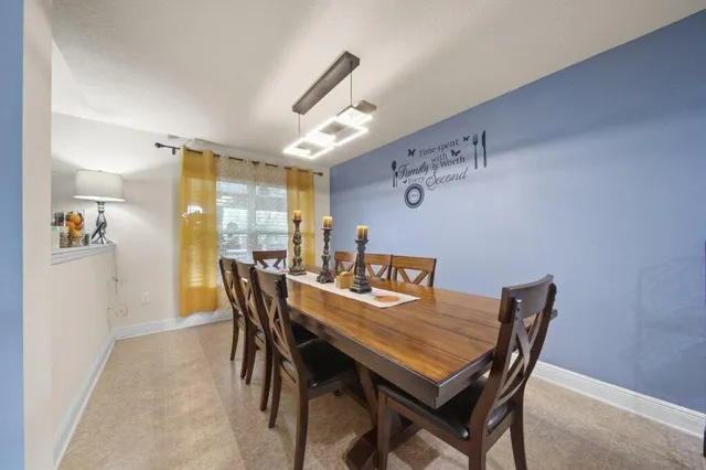a view of a dining room with furniture