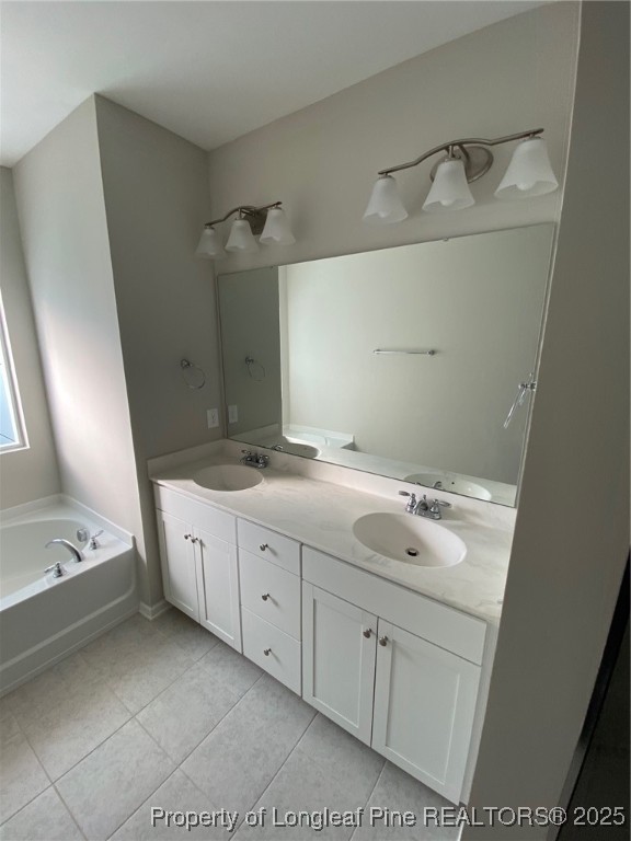 1206 Wingstem Place Cary, NC 27607 - Photo 16 of 26 a spacious bathroom with a granite countertop sink and a mirror