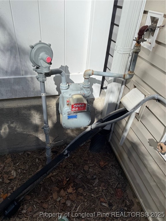 1206 Wingstem Place Cary, NC 27607 - Photo 21 of 26 a close view of water heater room