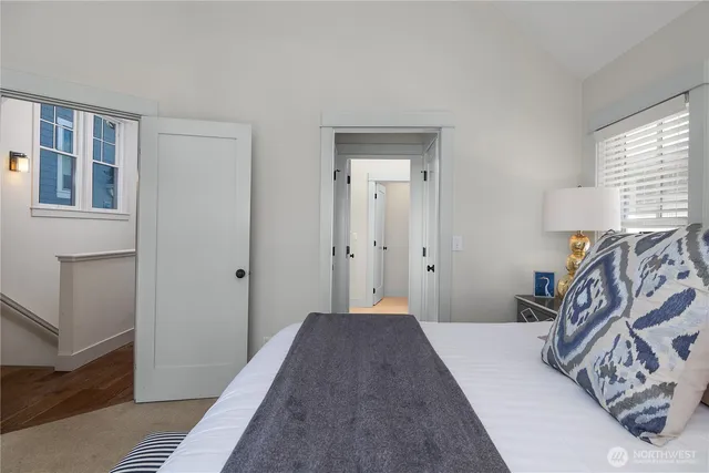 a bathroom with double sink and a mirror