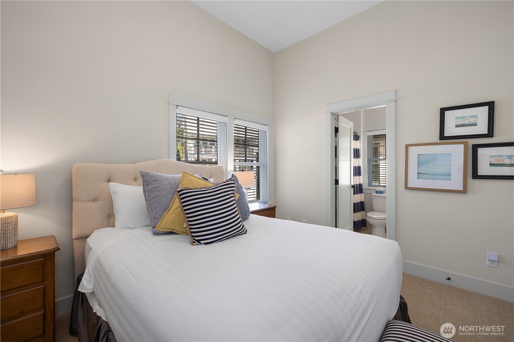 34 Seaside Lane Pacific Beach, WA 98571 - Photo 20 of 33 a bedroom with a bed and wooden floor