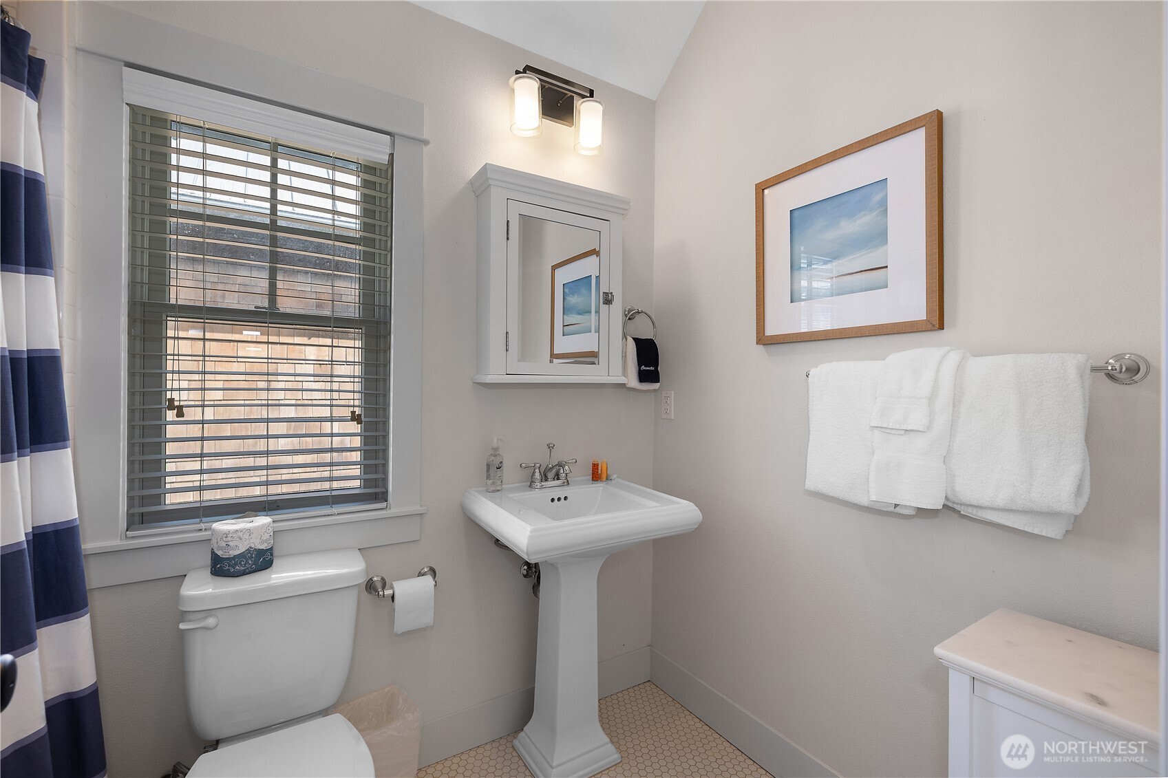 34 Seaside Lane Pacific Beach, WA 98571 - Photo 21 of 33 a bathroom with a sink and a mirror
