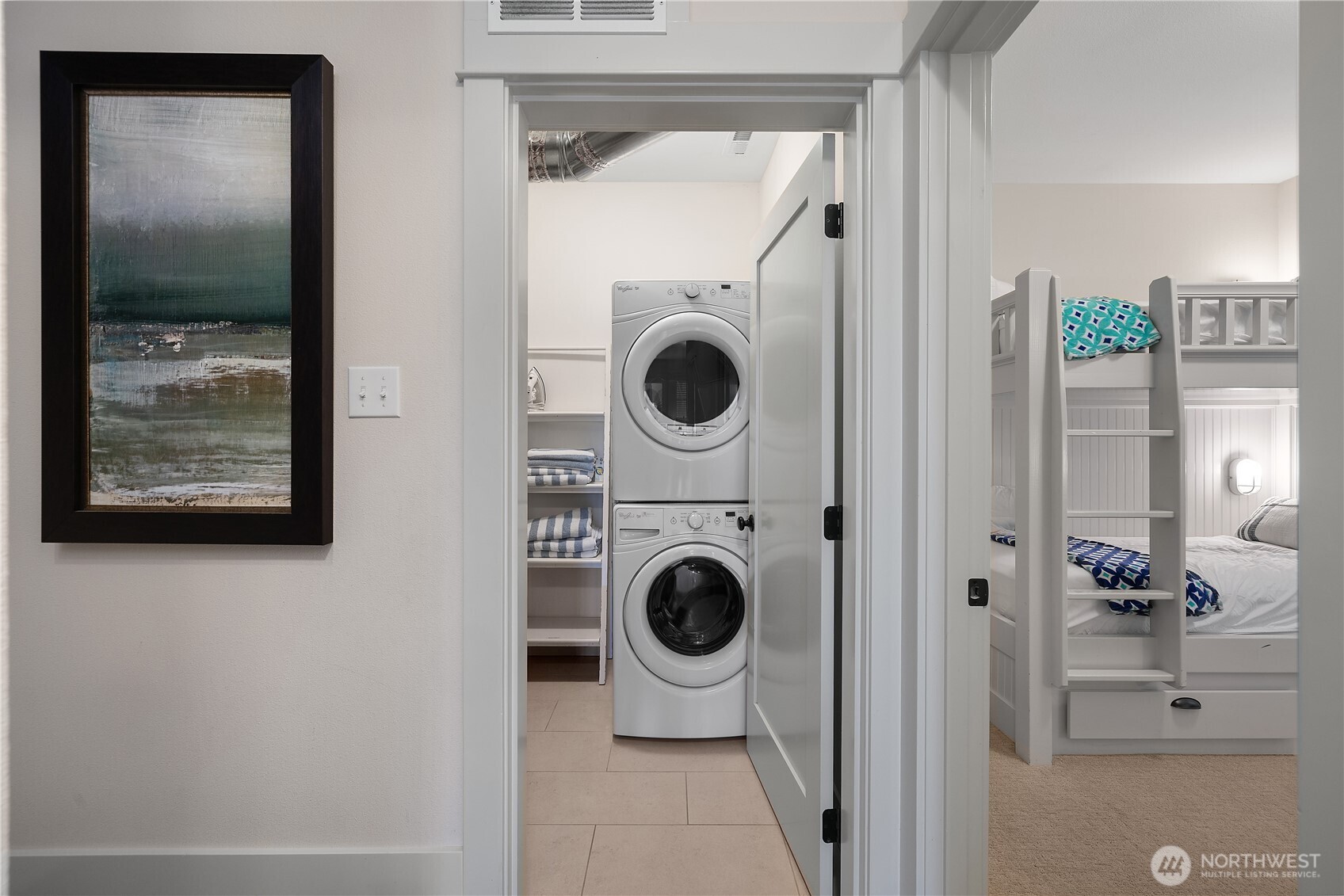 34 Seaside Lane Pacific Beach, WA 98571 - Photo 22 of 33 a view of a hallway with washer and dryer