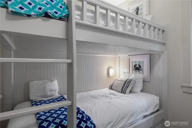 a bathroom with a sink a toilet and shower curtain