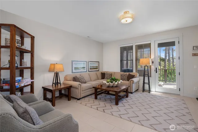 a living room with furniture and a table