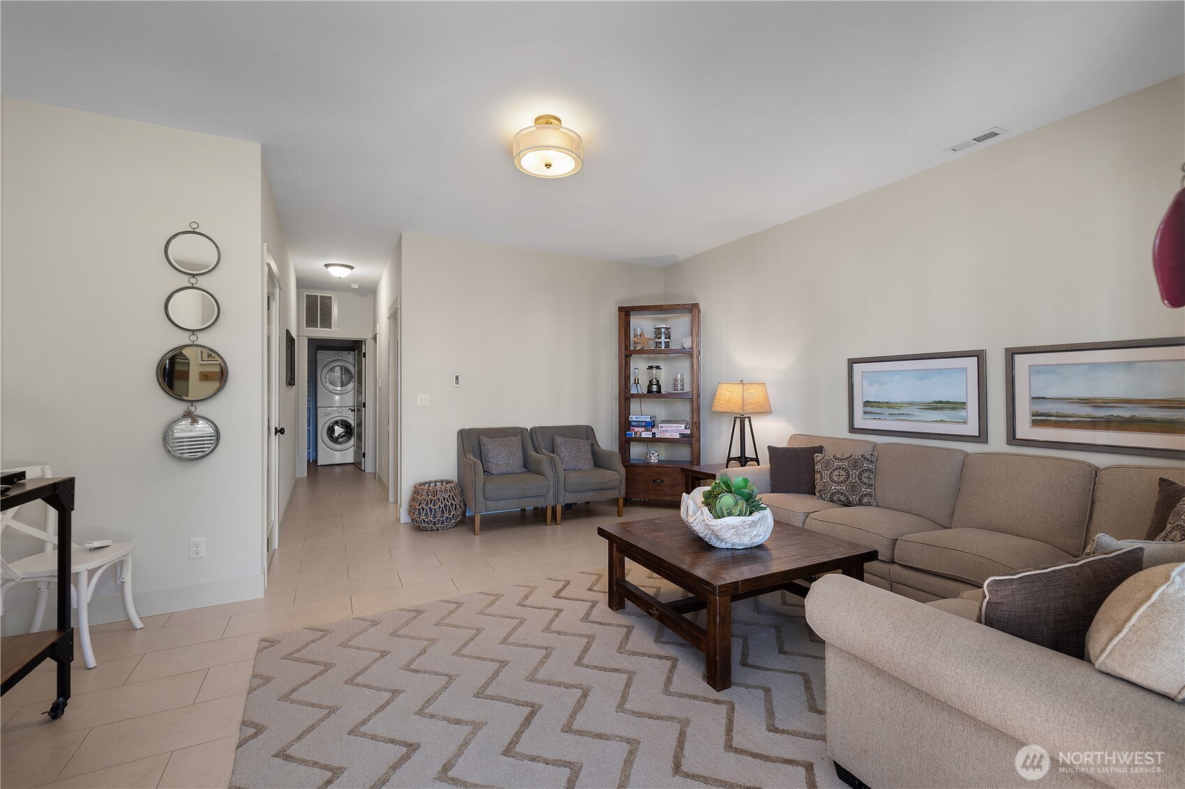 34 Seaside Lane Pacific Beach, WA 98571 - Photo 27 of 33 a living room with furniture and a table