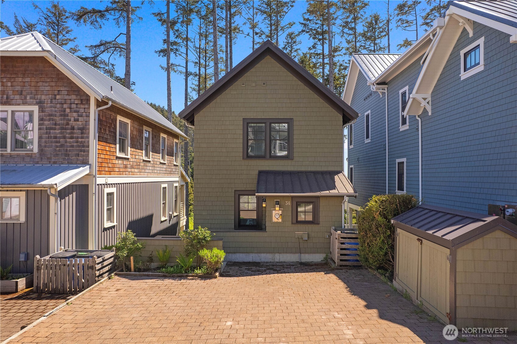 34 Seaside Lane Pacific Beach, WA 98571 - Photo 28 of 33 a front view of a house with garden