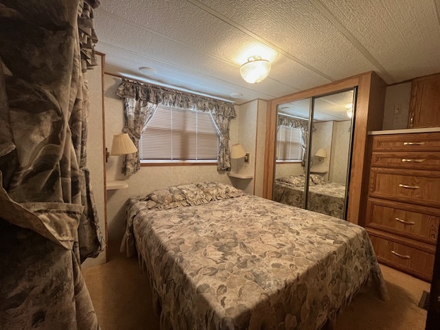 2795 East 28th Road Marseilles, IL 61341 - Photo 17 of 66 a bedroom with a bed and a dresser