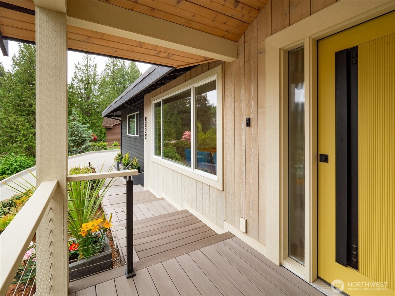 9503 Odin Way Bothell, WA 98011 - Photo 3 of 39 a view of balcony with furniture and wooden floor