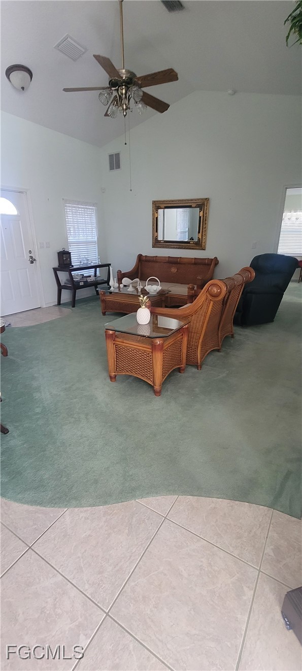 126-128 Tangerine Road Lake Placid, FL 33852 - Photo 12 of 29 a bedroom with furniture and a ceiling fan