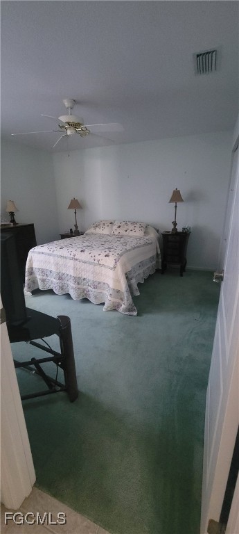 126-128 Tangerine Road Lake Placid, FL 33852 - Photo 17 of 29 a bedroom with a bed and a table
