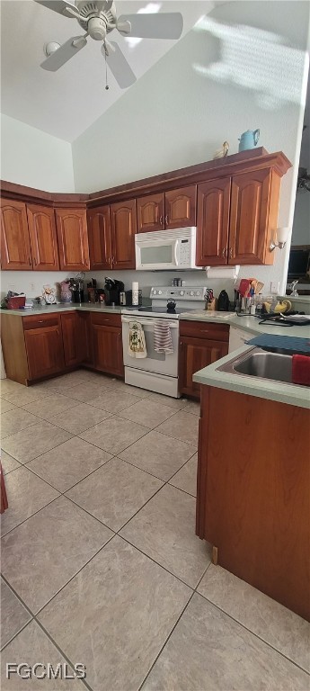 126-128 Tangerine Road Lake Placid, FL 33852 - Photo 20 of 29 a kitchen with stainless steel appliances granite countertop a stove a sink dishwasher and a refrigerator