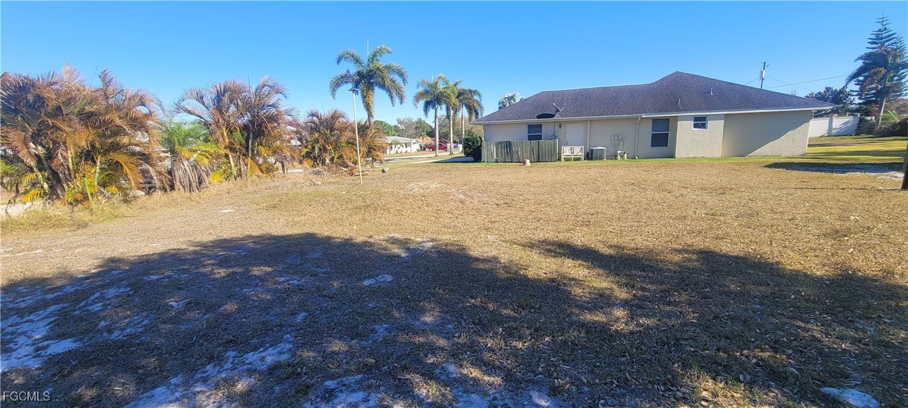 126-128 Tangerine Road Lake Placid, FL 33852 - Photo 27 of 29 a view of a house with a yard and covered with snow