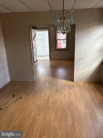 a view of a livingroom with wooden floor
