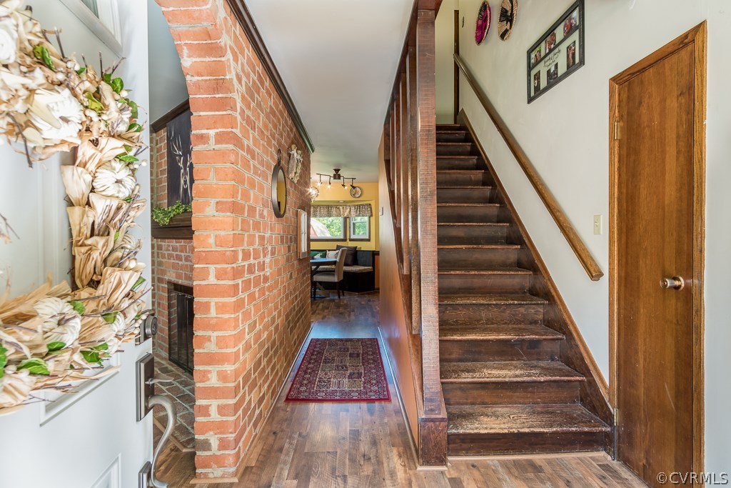 2521 Mountain View Road Powhatan, VA 23139 - Photo 3 of 29 Beautiful brick accent wall as you enter the home.