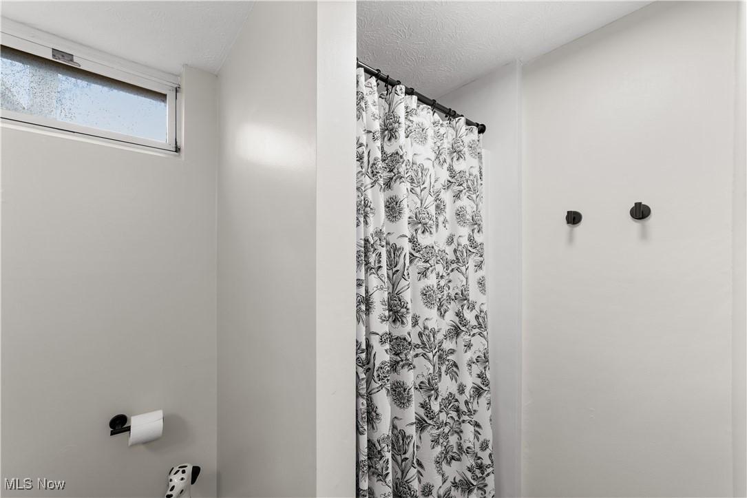 2977 Reeves Road Willoughby, OH 44094 - Photo 34 of 49 Basement full bathroom with a shower