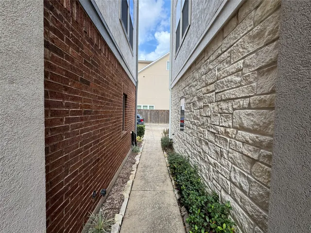a pathway between two buildings