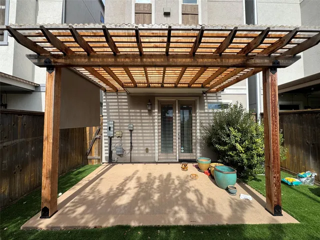 a room with cabinets and wooden floor