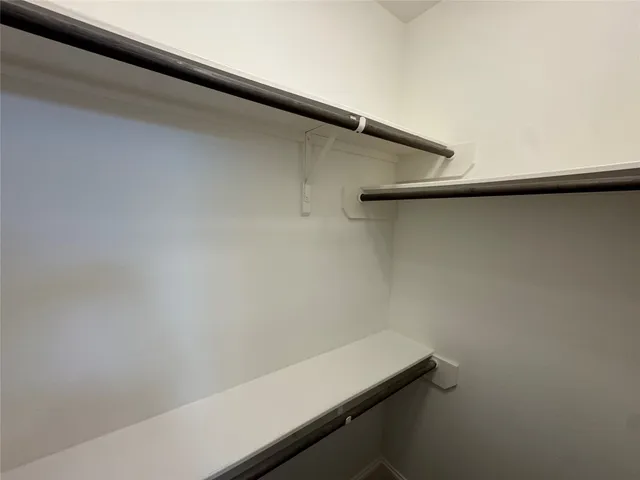 a view of an entryway with a small yard