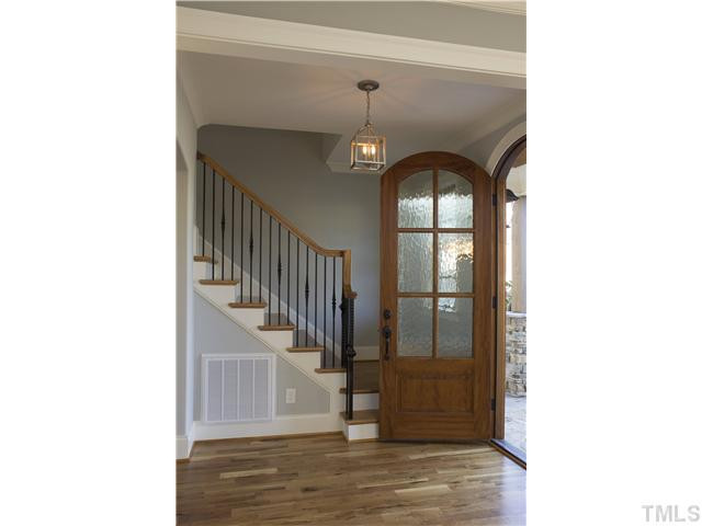 8505 Wynhurst Court, Unit 15 Raleigh, NC 27613 - Photo 3 of 25 a view of entryway and hall with wooden floor