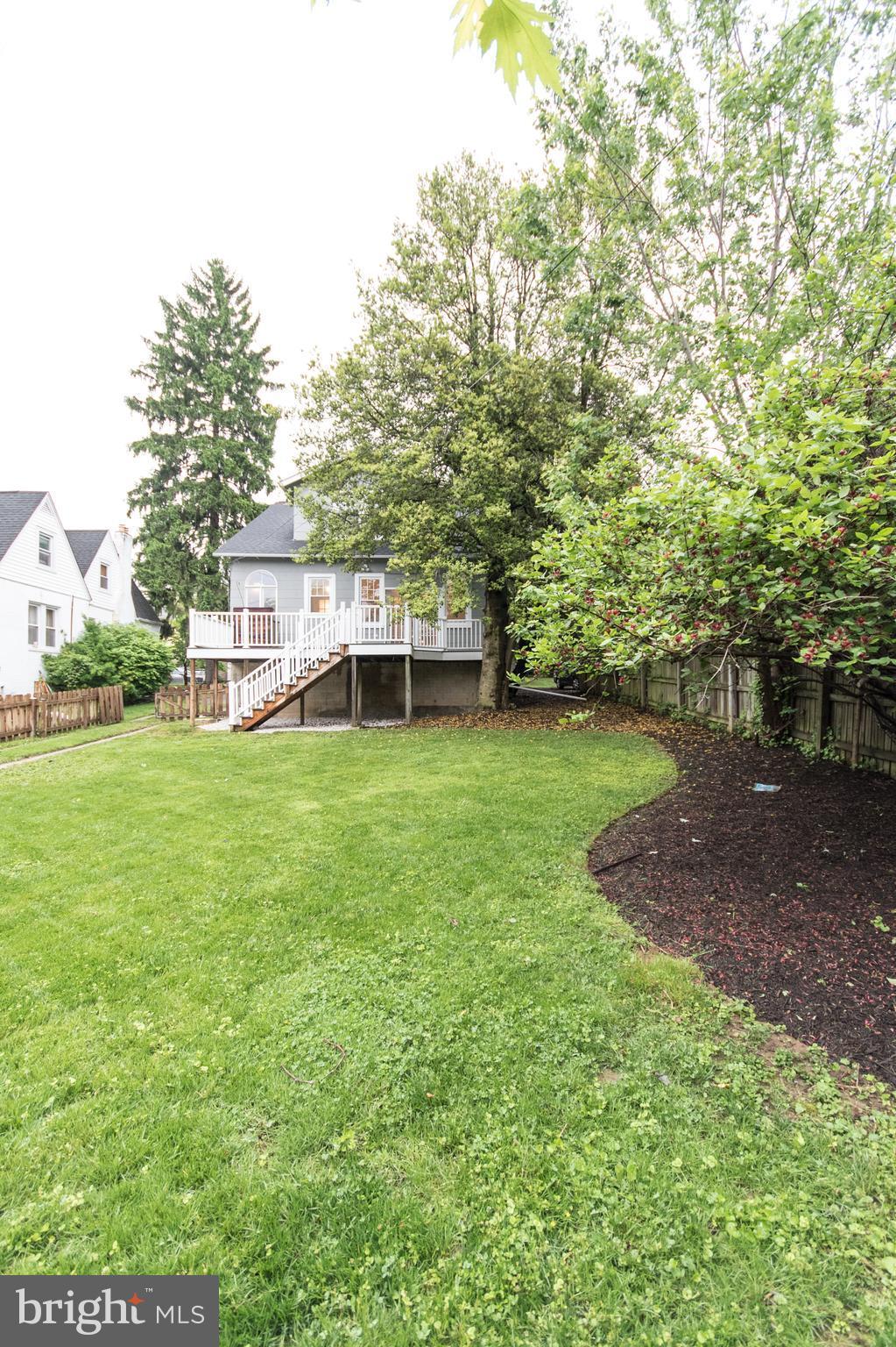 511 Dunkirk Road Baltimore, MD 21212 - Photo 26 of 27 a view of a house with a yard porch and sitting area