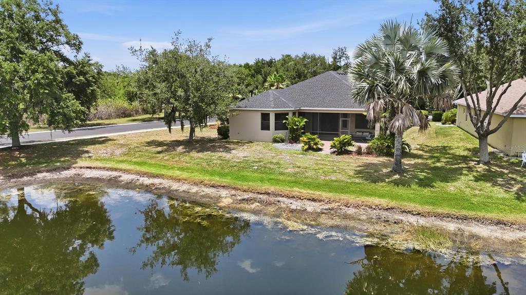 428 Snapdragon Loop Bradenton, FL 34212 - Photo 29 of 33 a view of a house with backyard and sitting area