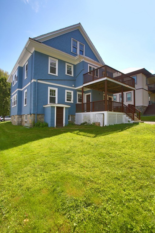 14-16 Presentation Road Boston, MA 02135 - Photo 11 of 12 a front view of a house with a yard